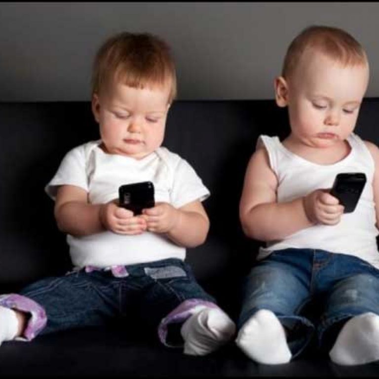 limiting technology two little boys on smart phones